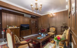 Baber Mahal Vilas Royal Suite Living Room with Traditional Wood Carved Furniture and Jhoola