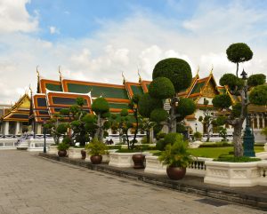 Wat Pho temple complex in Bangkok featuring traditional Thai architecture and manicured gardens