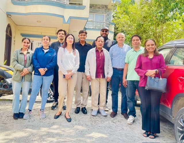 EHT Travel team members standing together at the company office in Kathmandu, Nepal