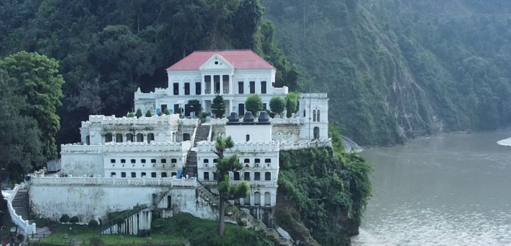 At Palpa-Gauda, Khadga Shumsher's youngest wife Queen Tej Kumari Devi died in 1892. To commemorate his grief and the queen's last wish to construct a place of pilgrim, Khadga decided to build a palace. The name Rani Mahal literally translates as Queen's Palace.