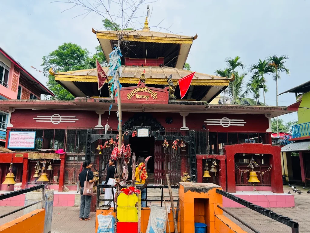 A front view of the sacred Dantakali Temple located on the lush green hills of Bijayapur in Dharan, Nepal.